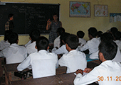 Volunteers teaching English to Cambodian students